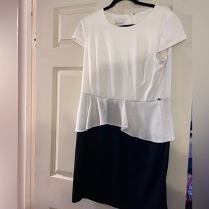 Black and white peplum mini dress